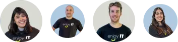 Four smiling team members wearing black shirts with 'enjoy IT' logo against a light background.