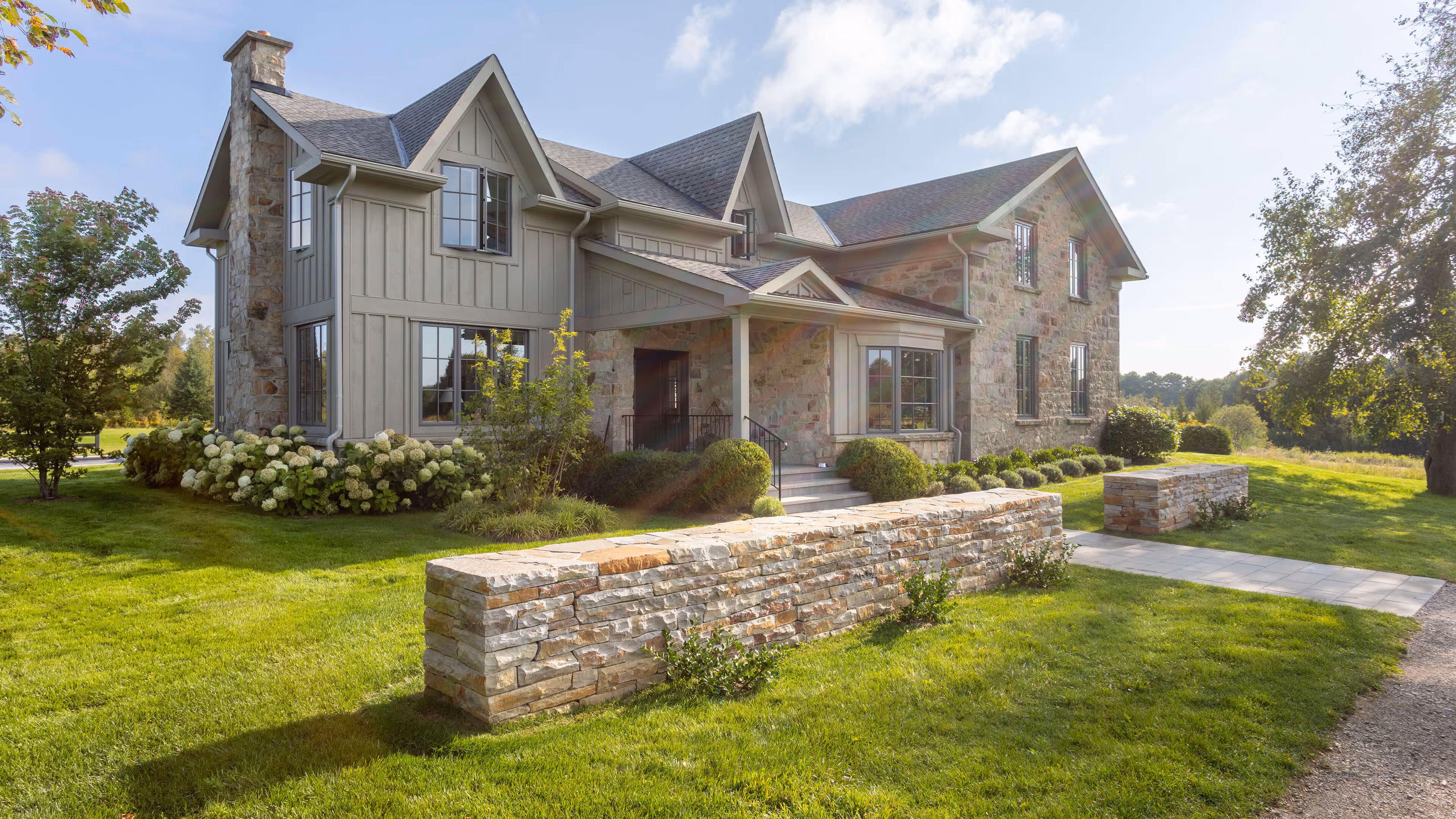 backyard landscaping with pool featureing waterfalls flowing into the pool, cabana with fireplace