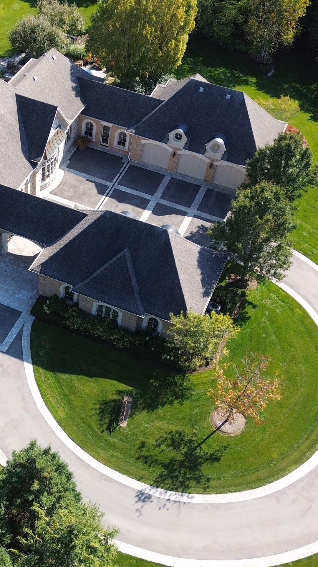 backyard landscaping with pool featureing waterfalls flowing into the pool, cabana with fireplace