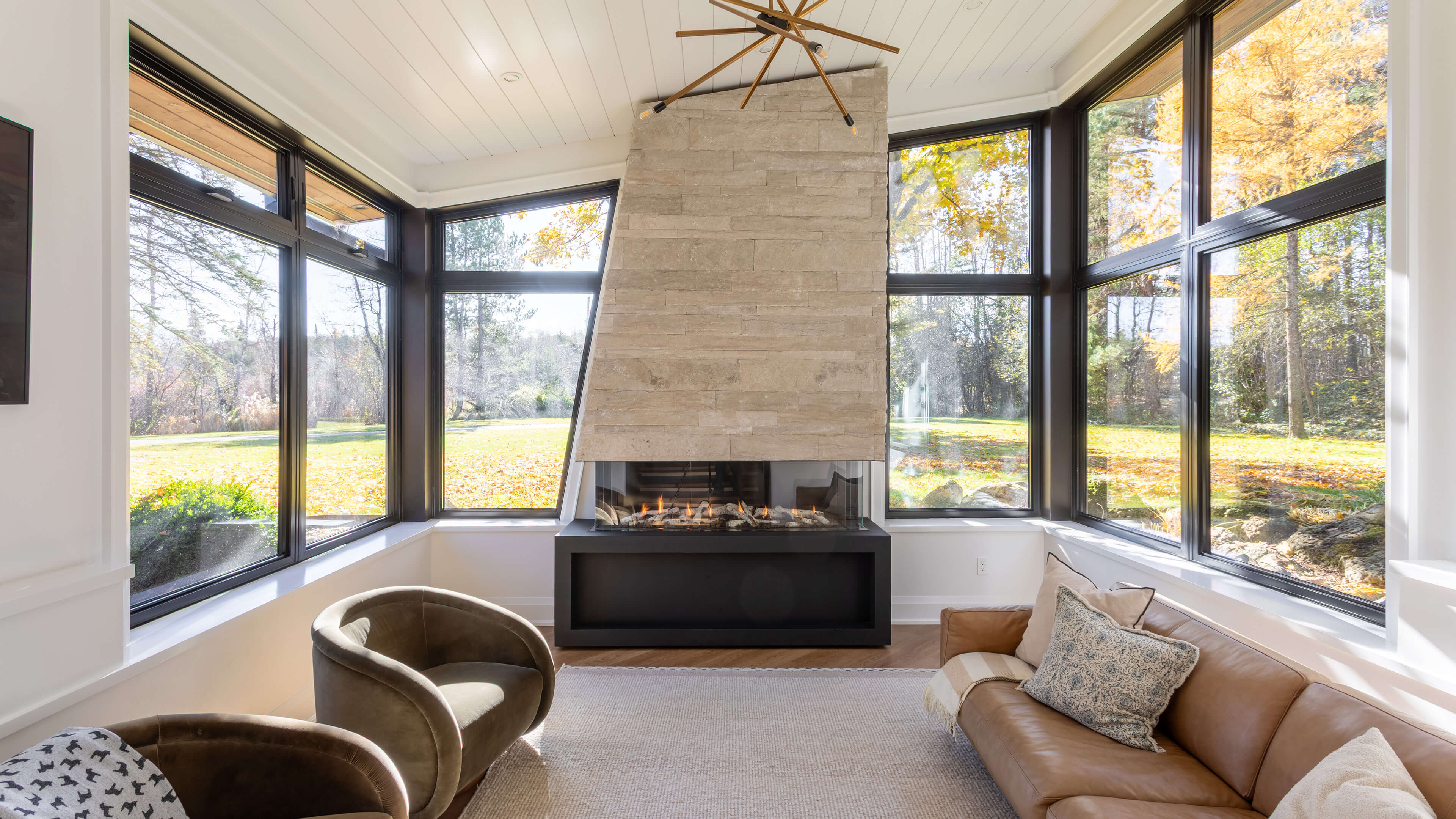 backyard landscaping with pool featureing waterfalls flowing into the pool, cabana with fireplace