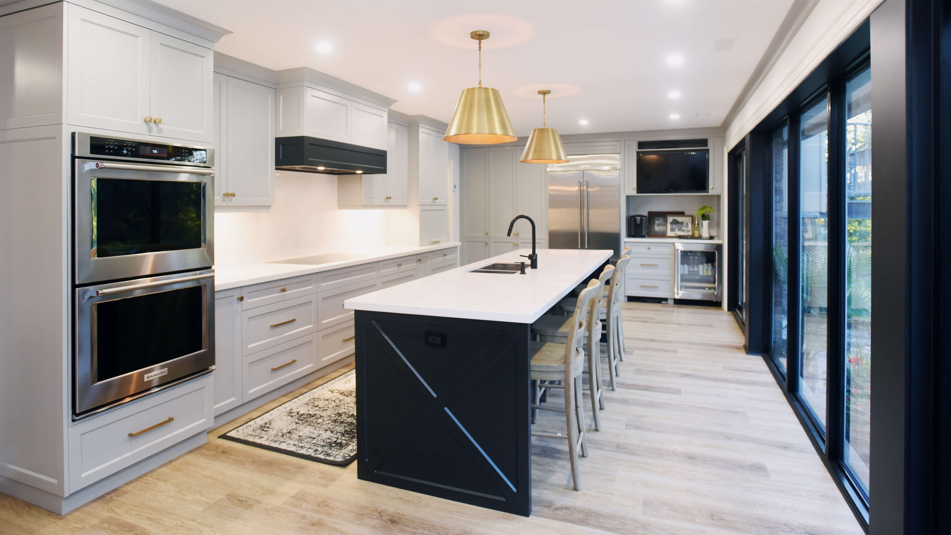 backyard landscaping with pool featureing waterfalls flowing into the pool, cabana with fireplace