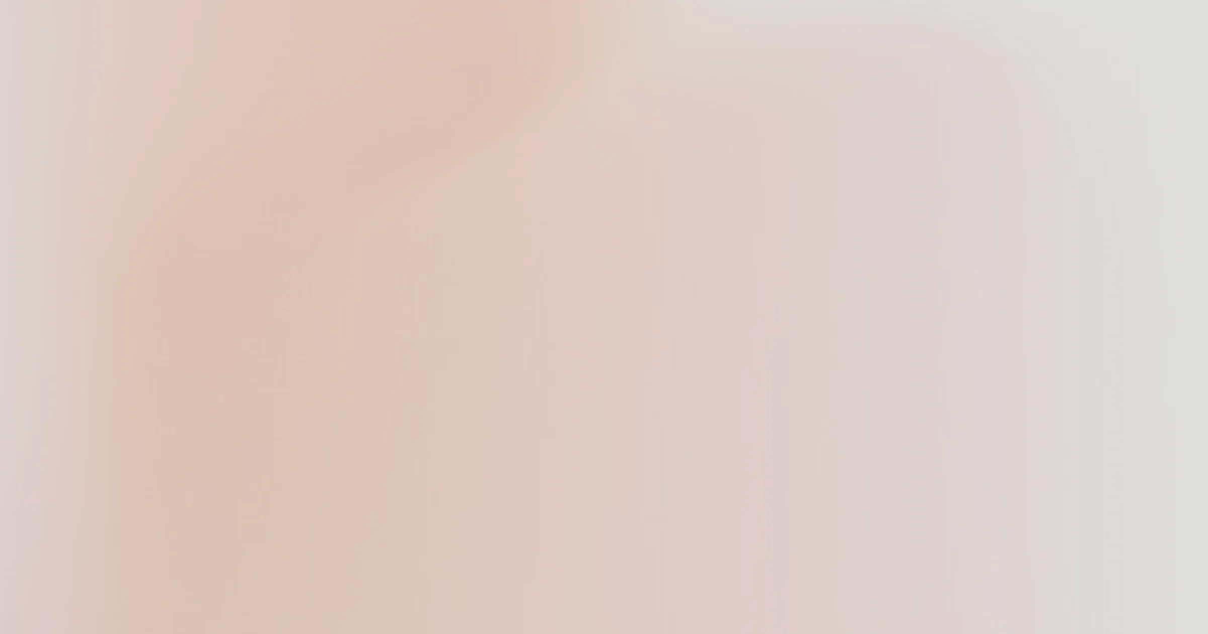 Soft gradient background blending peach, beige, and light gray tones.