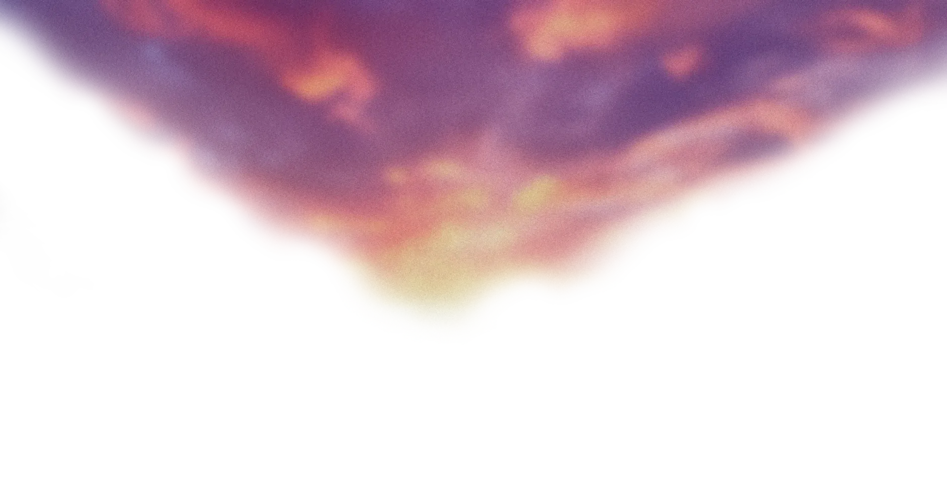 Vivid sky at sunset with pink, purple, and orange clouds.