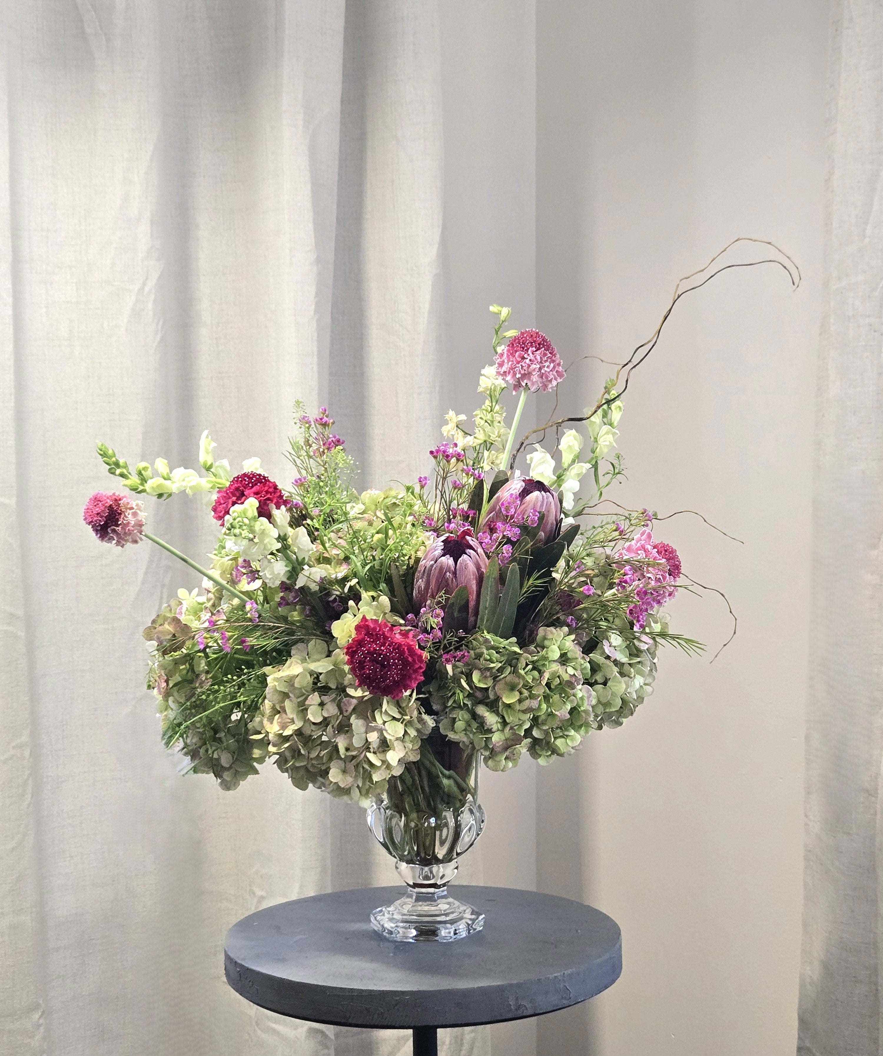 To The Moon And Back - A Hydrangea and Protea Arrangement