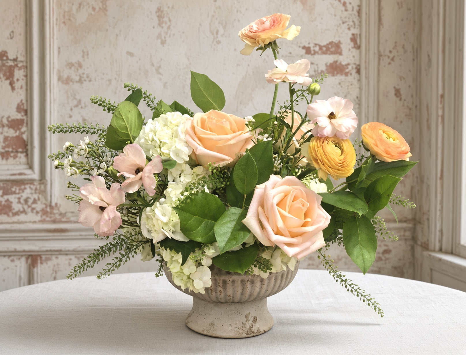 Early Autumn - An Asymmetrical Arrangement With Roses And Ranunculus
