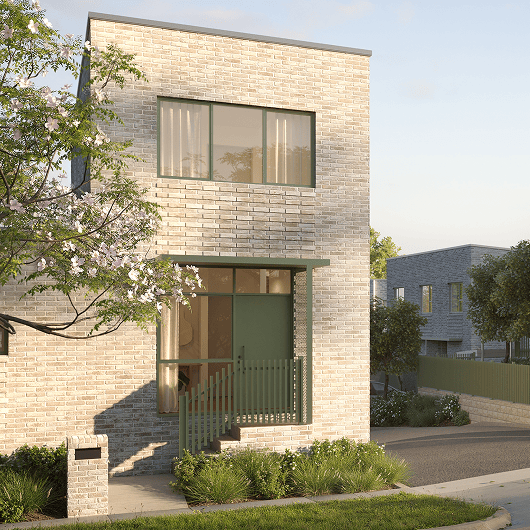 Modern two-story brick house with green window frames, a front porch, and surrounding greenery.