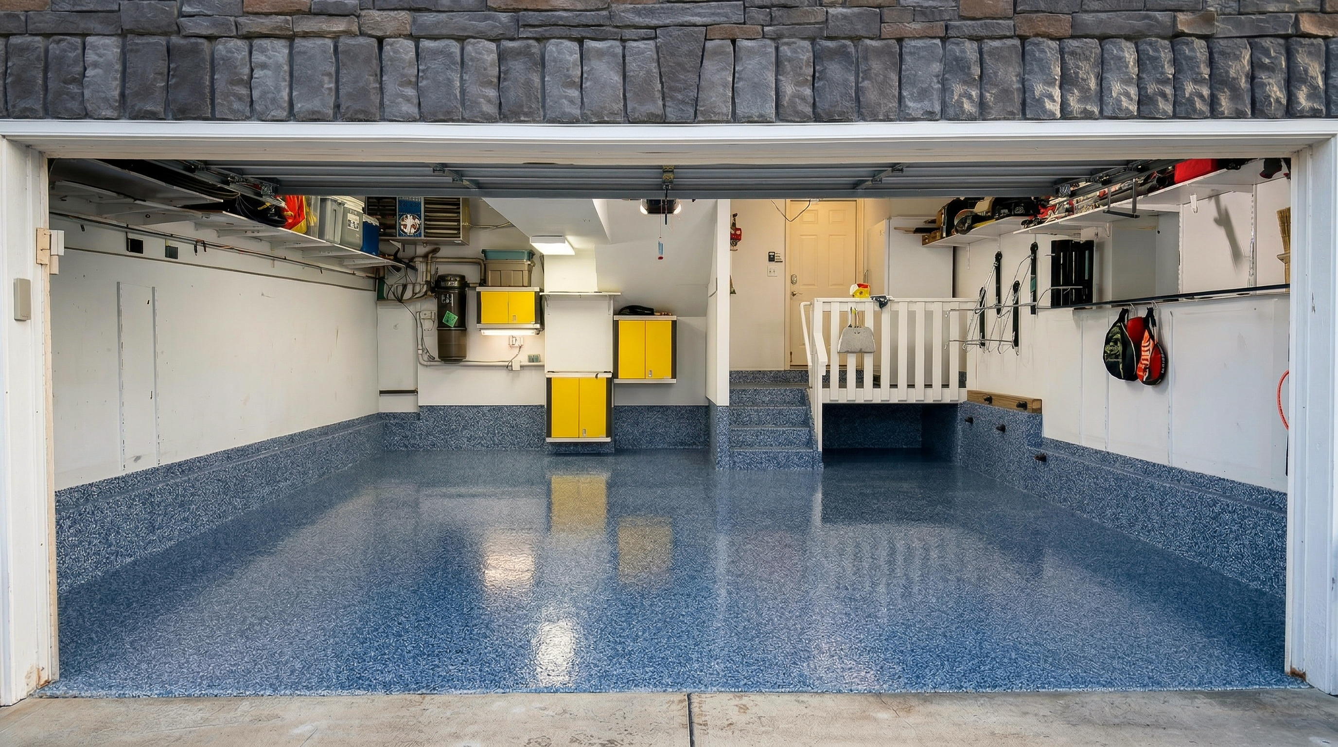 Before: blue flake epoxy garage floor