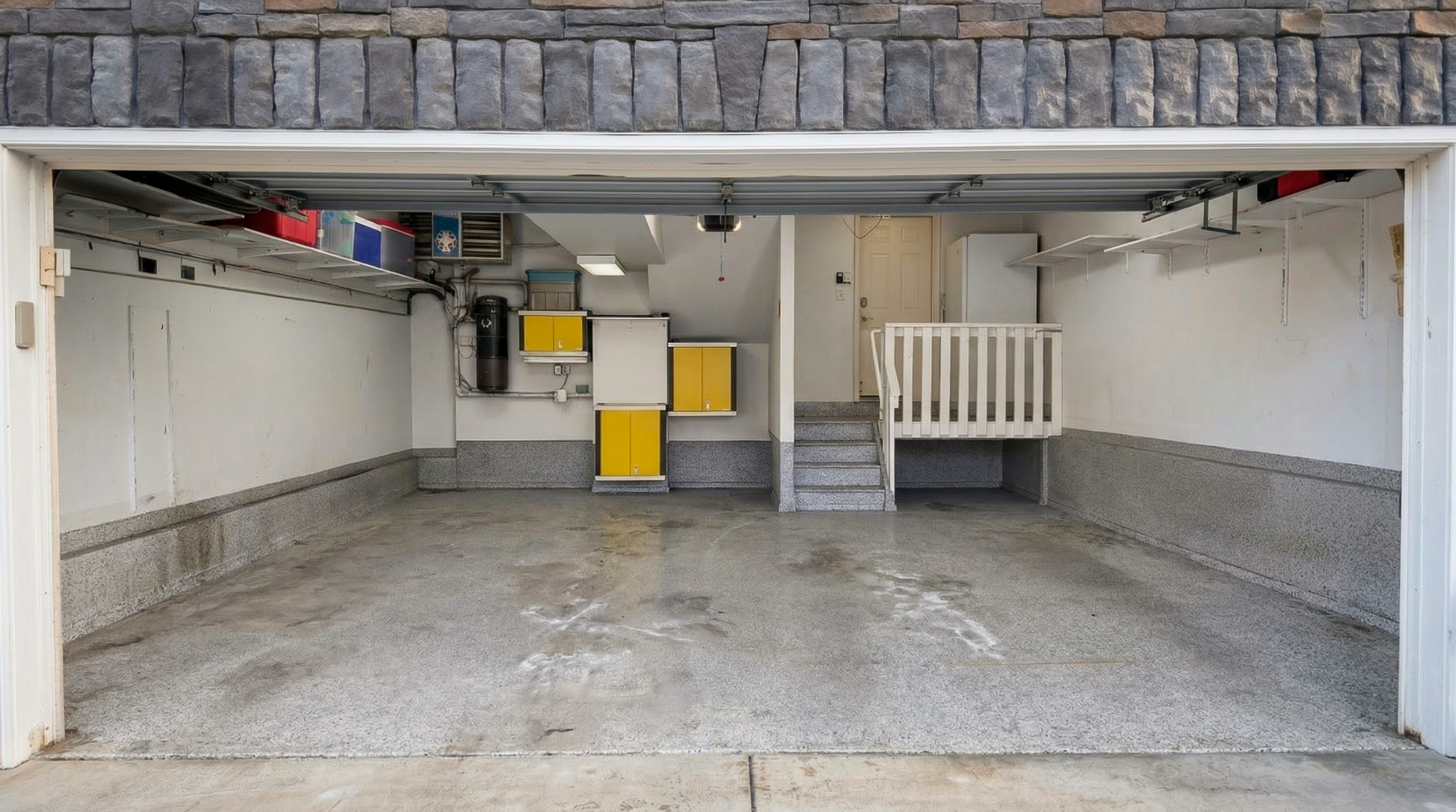After: bare concrete garage floor