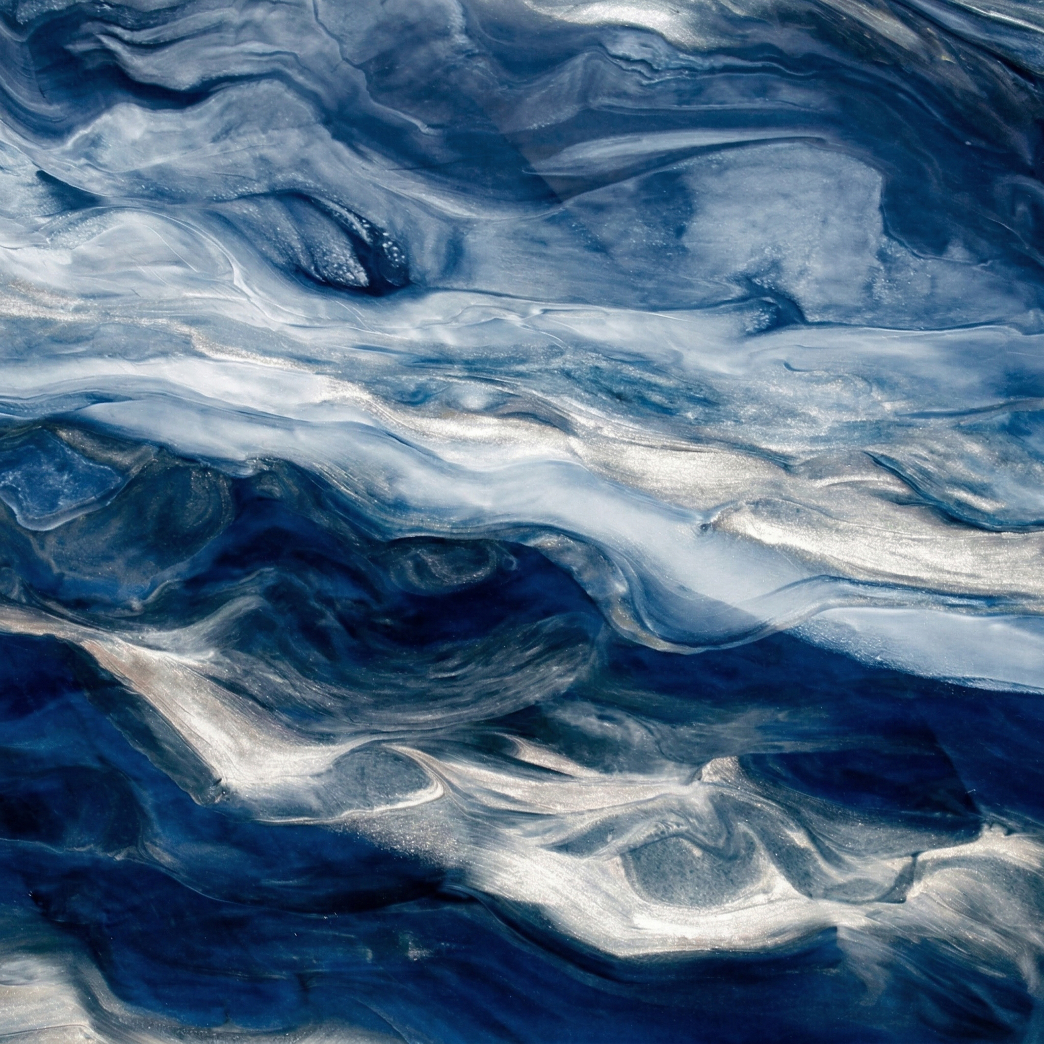 Midnight Blue metallic epoxy floor finish - deep blue and silver waves