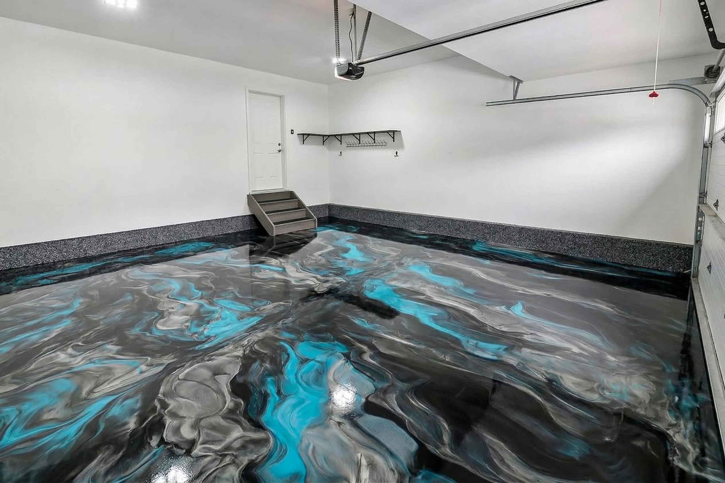 Completed metallic epoxy garage floor in Okotoks Alberta by Epoxy Floors Canada