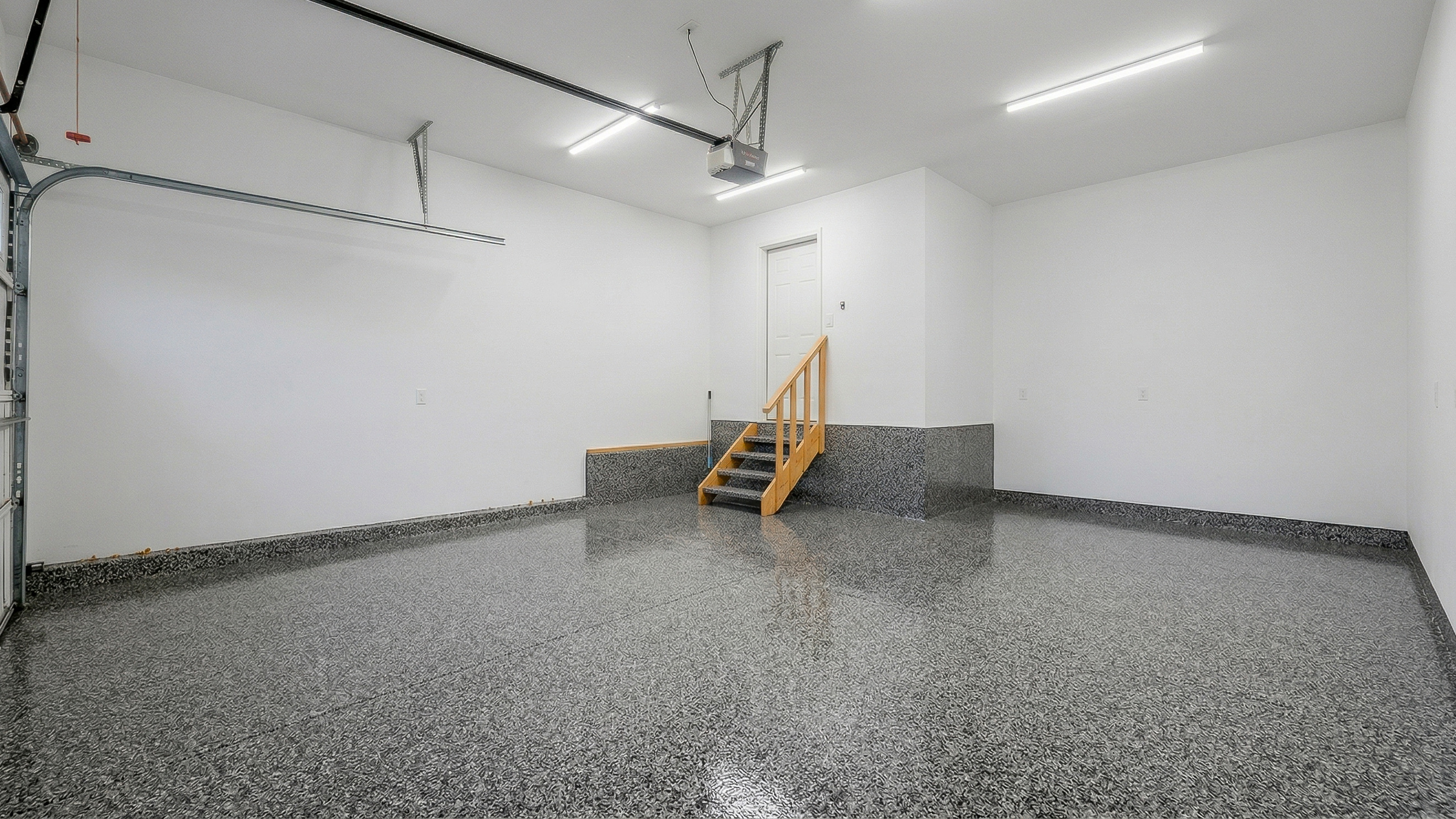 Flake epoxy garage floor coating installed in Calgary - Epoxy Floors Canada