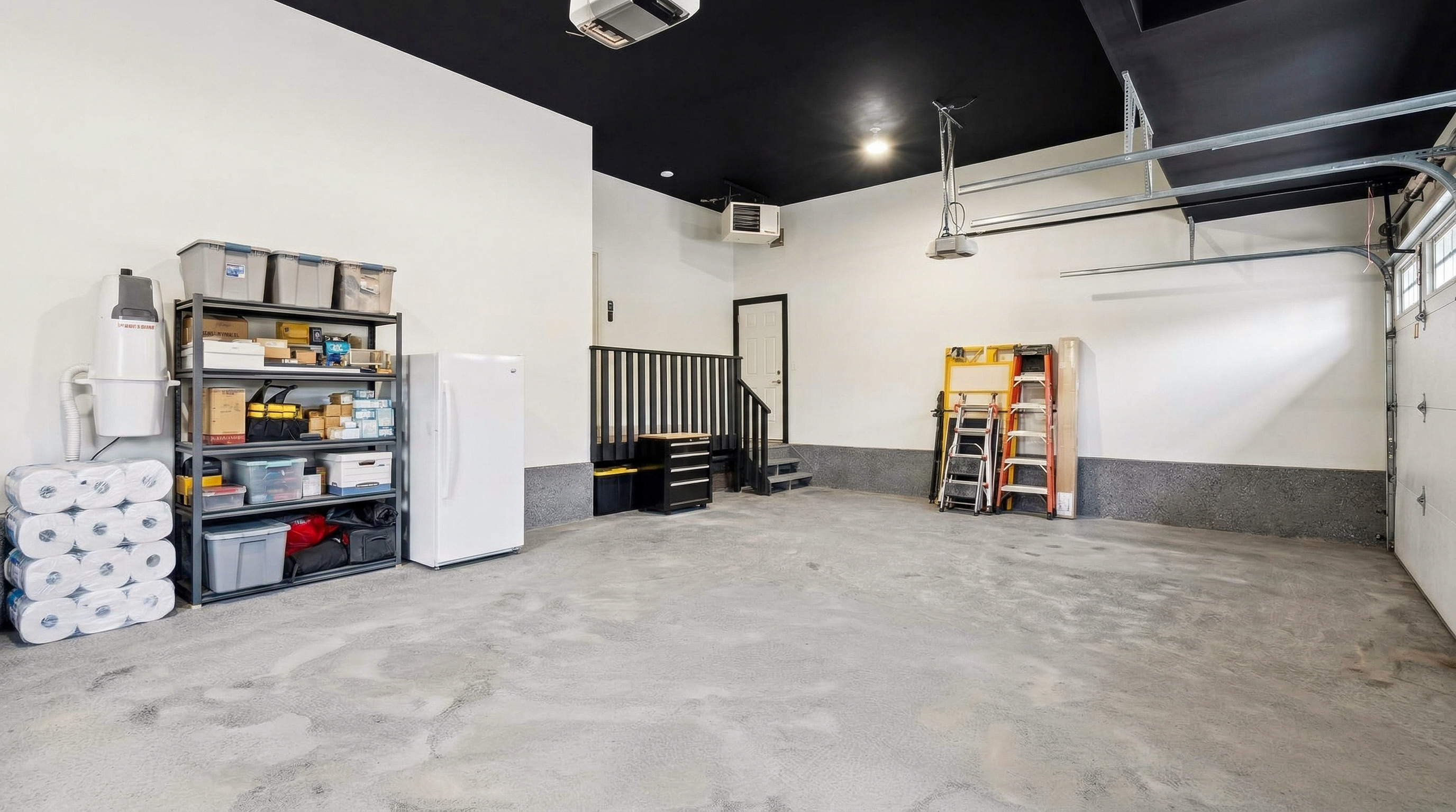 Before: bare concrete garage floor