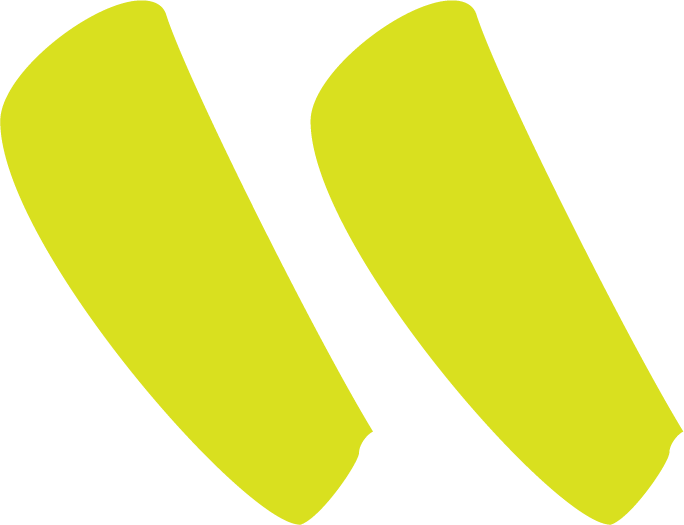 Two large yellow quotation marks on a white background.