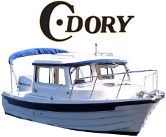 White and blue cabin cruiser boat with C-Dory logo above it.