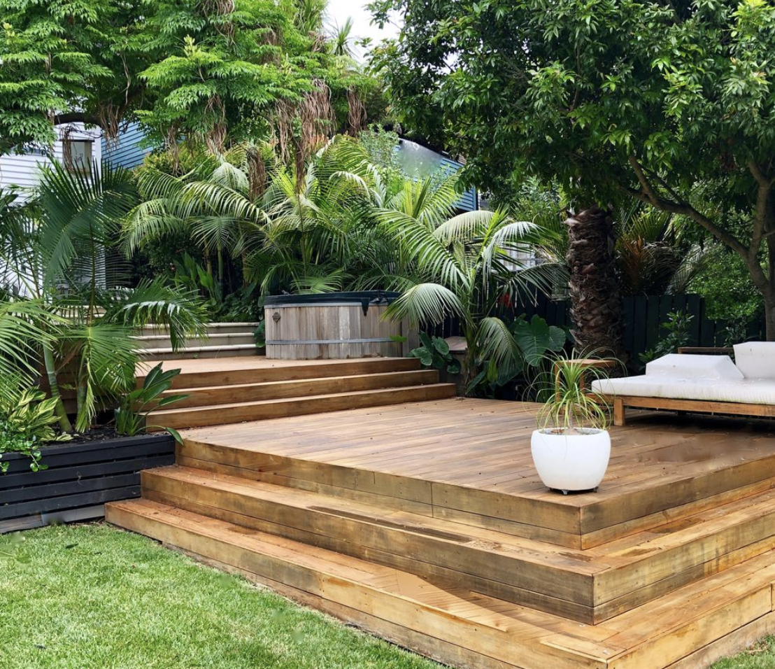 image of gardening tools organized on a wall (for a landscaping service)
