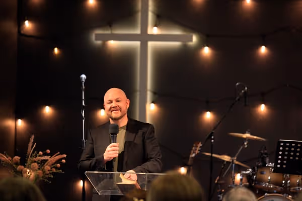Pastor Ben delivering a Sunday sermon at Canberra International Church. 