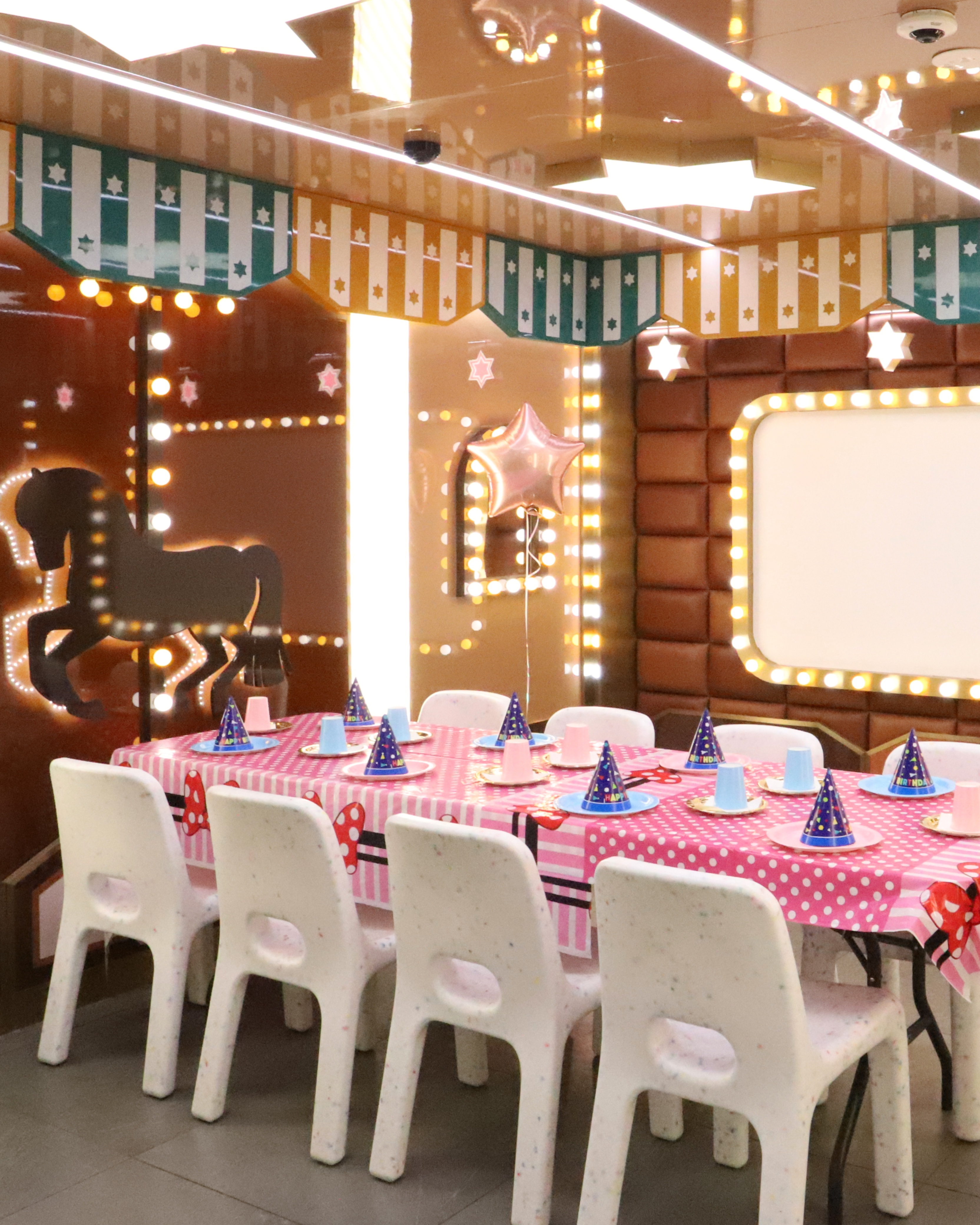 Private birthday party room with neon sign at KOKO Amusement Town Hall