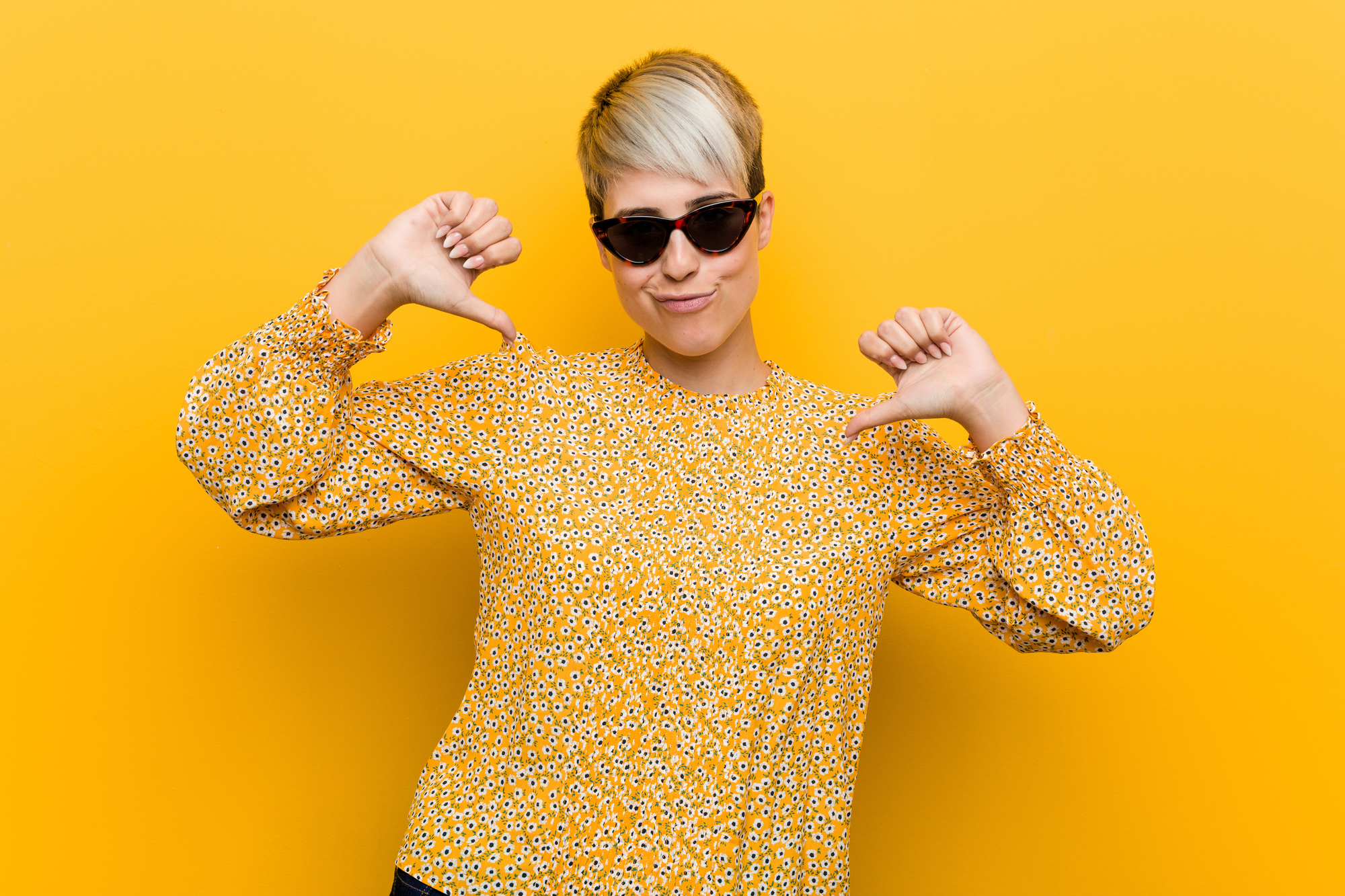 influencer pointing at herself