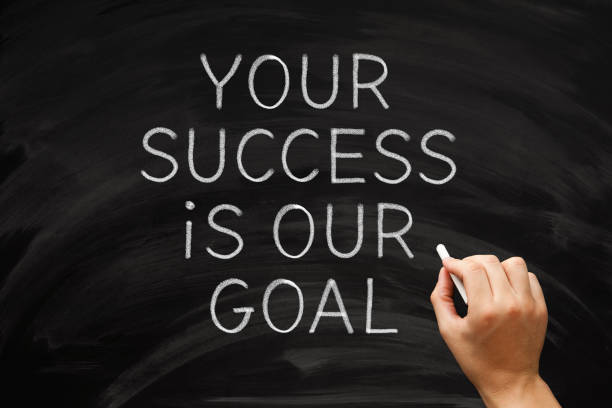 your success is our goal written on blackboard