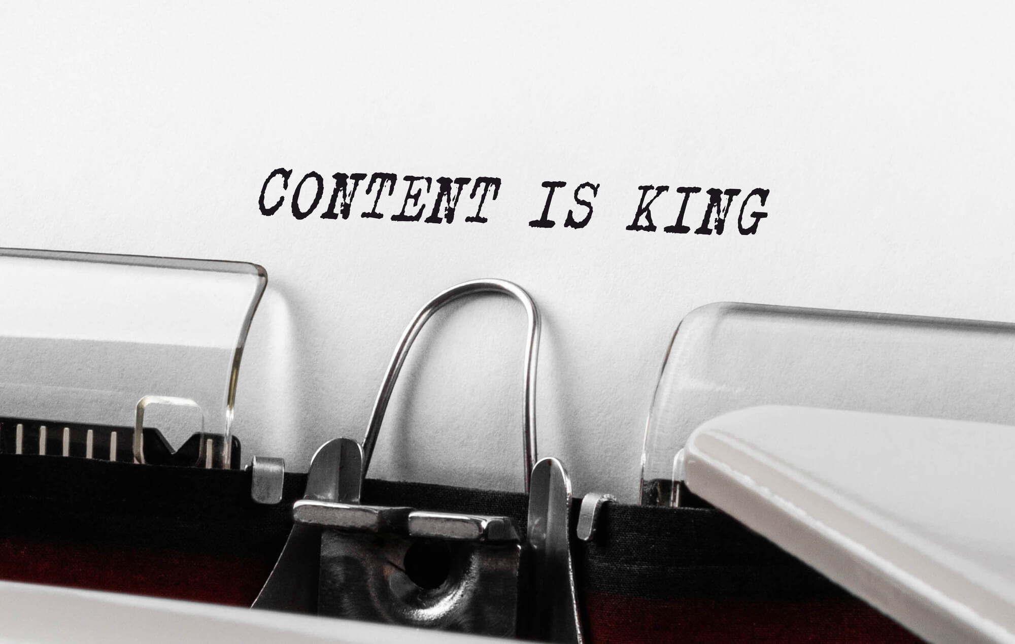 content is king written from typewriter