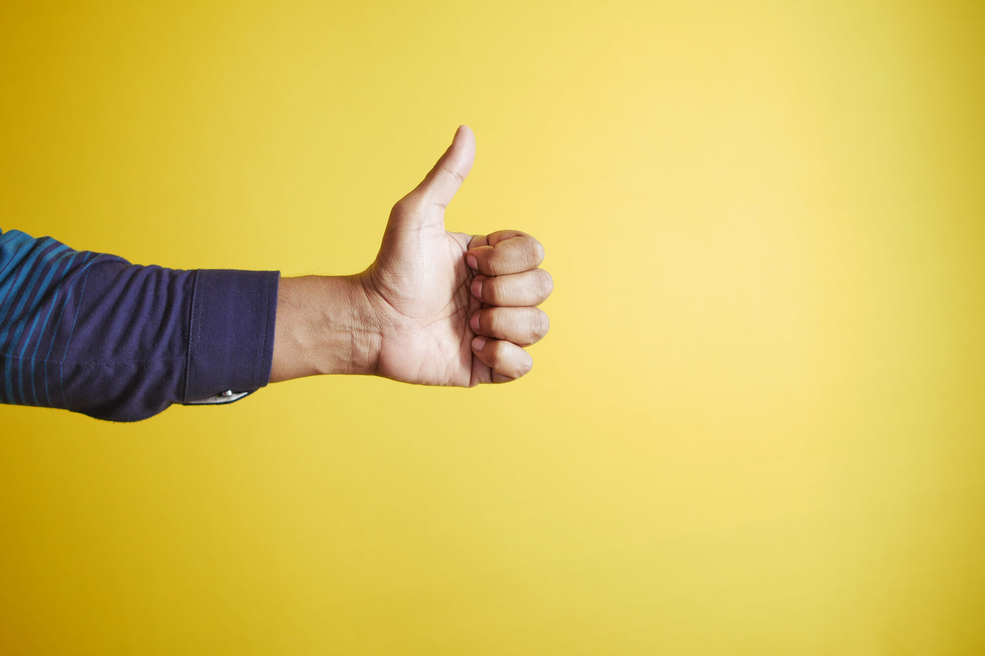 thumbs up with yellow background