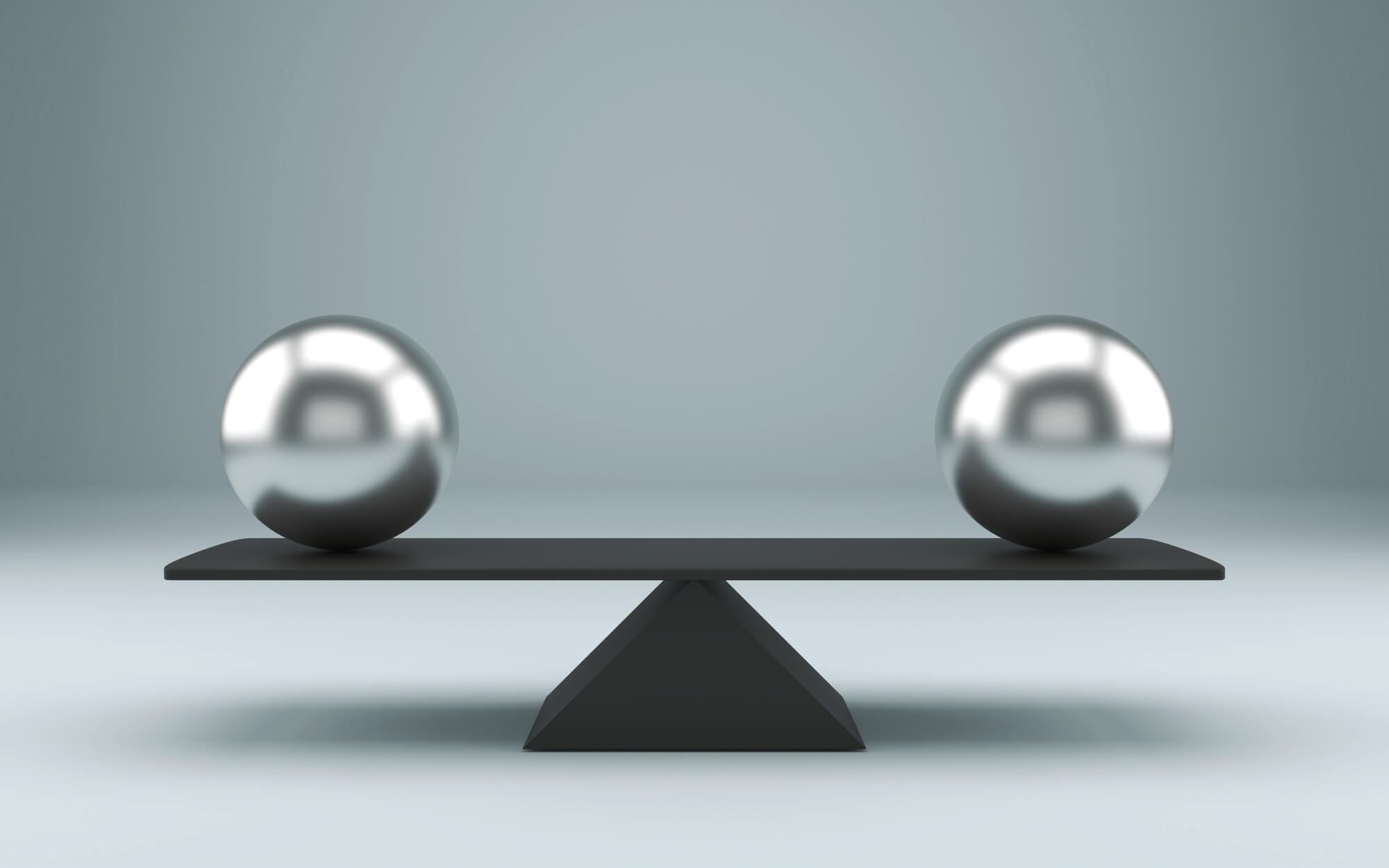 magnetic balls balancing on a beam