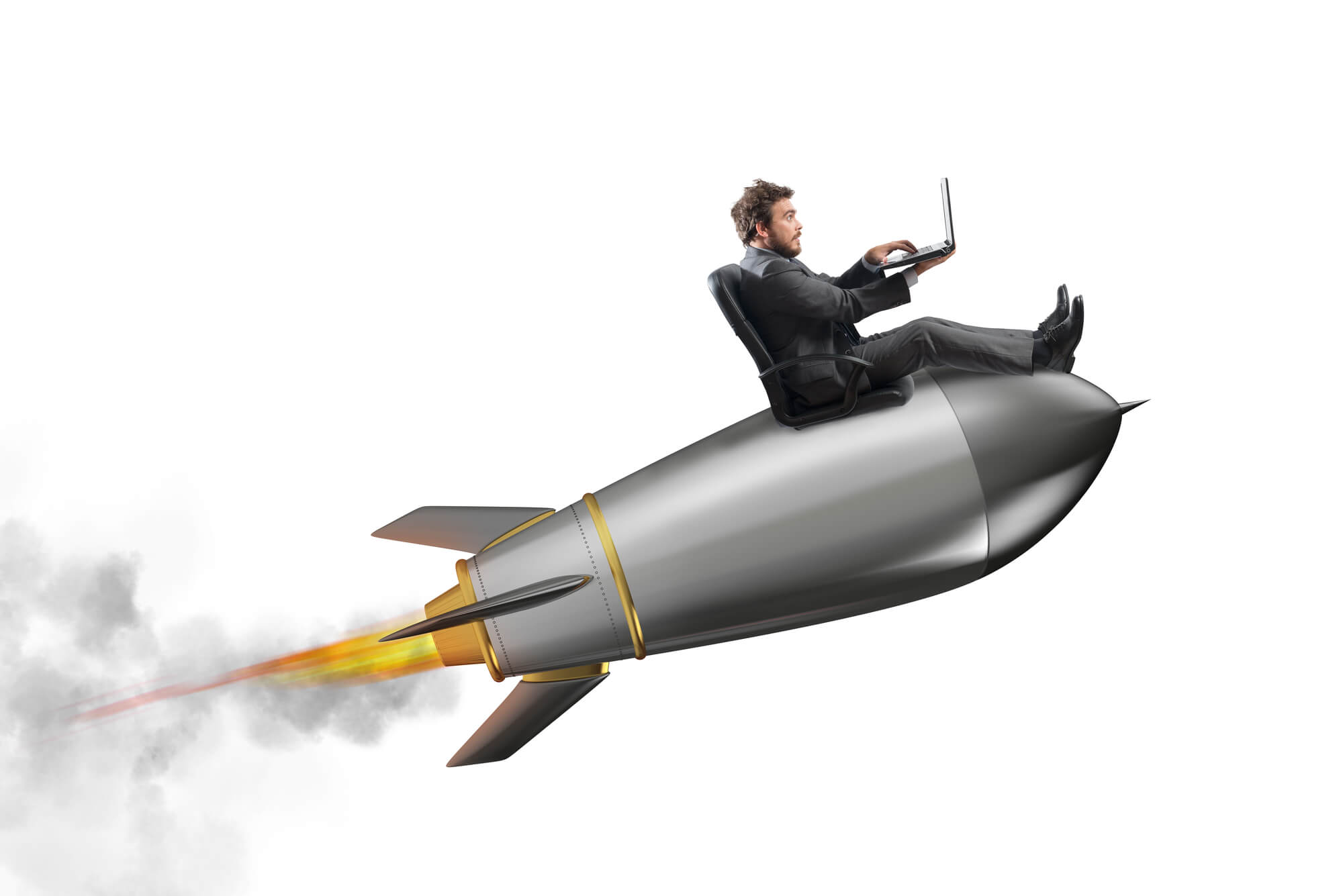 businessman using laptop while riding rocket to success