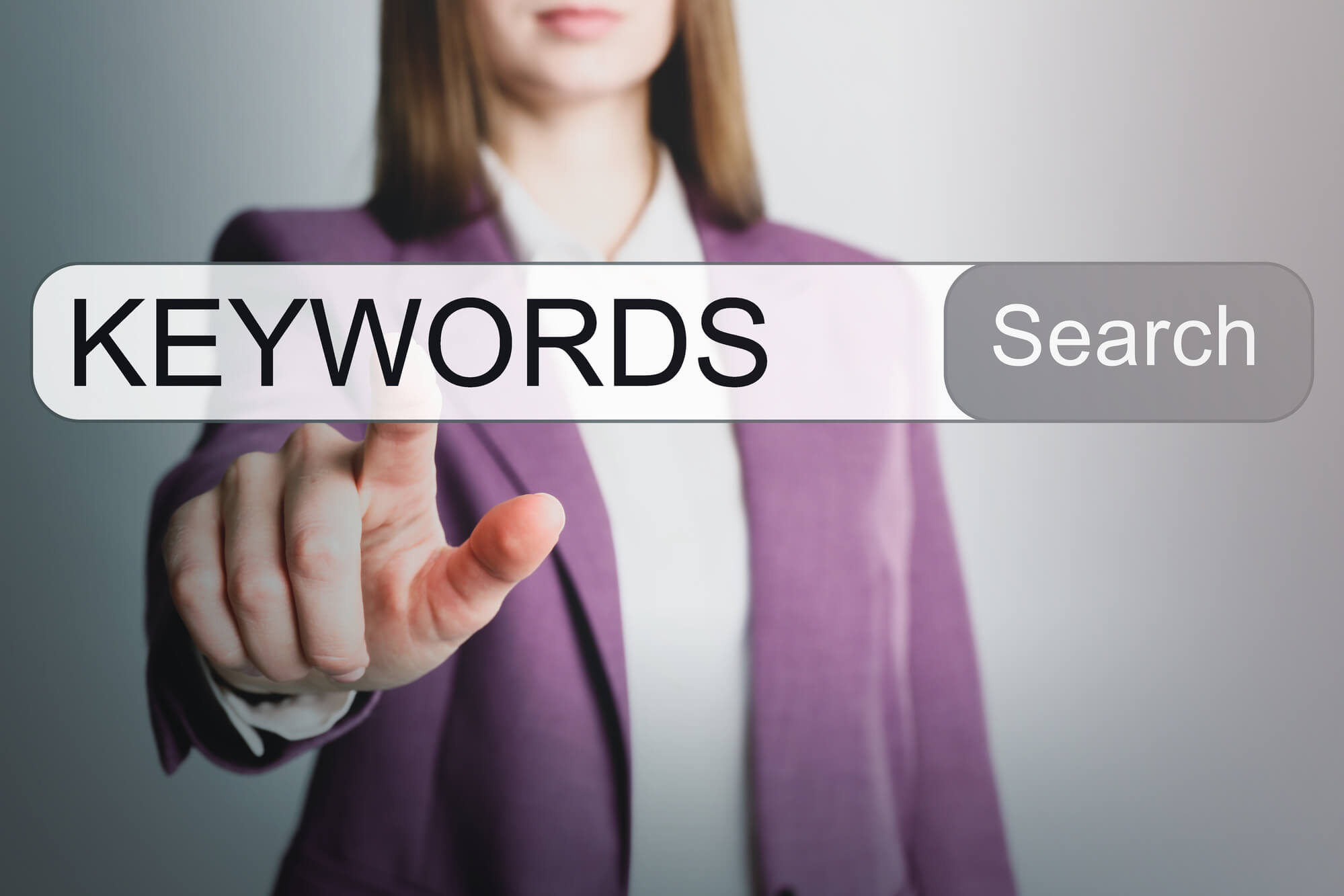 woman pointing to keywords on search engine
