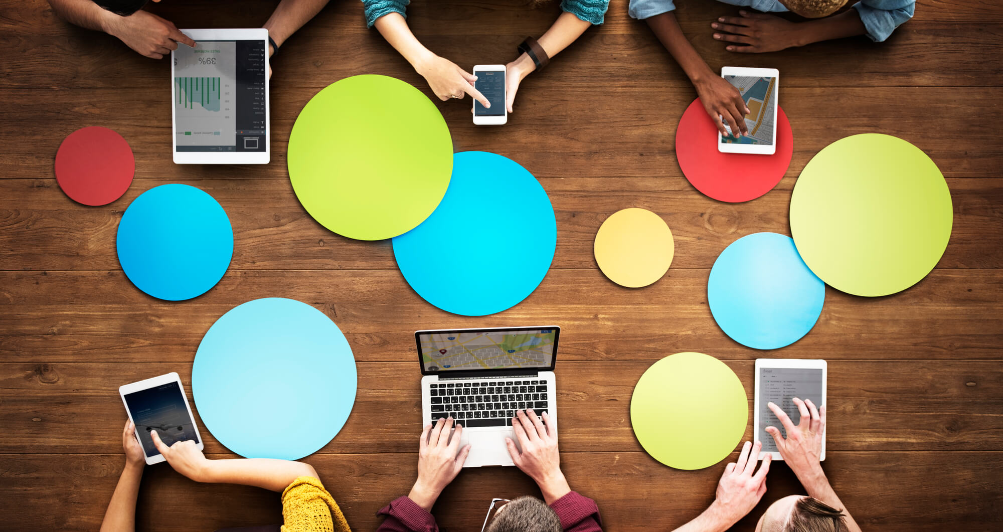 digital marketing experts working on different devices