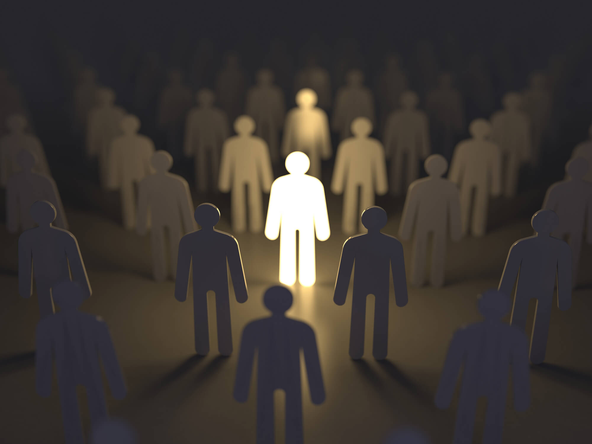 spotlight shining on a single man