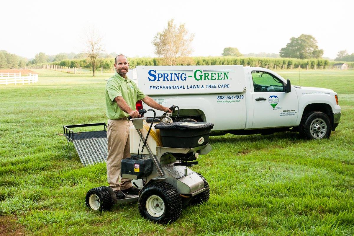 lawn care expert working in the field