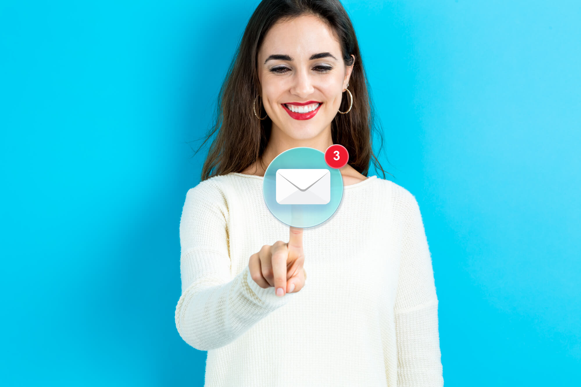 image of smiling woman clicking on an email from SEO in Miami company