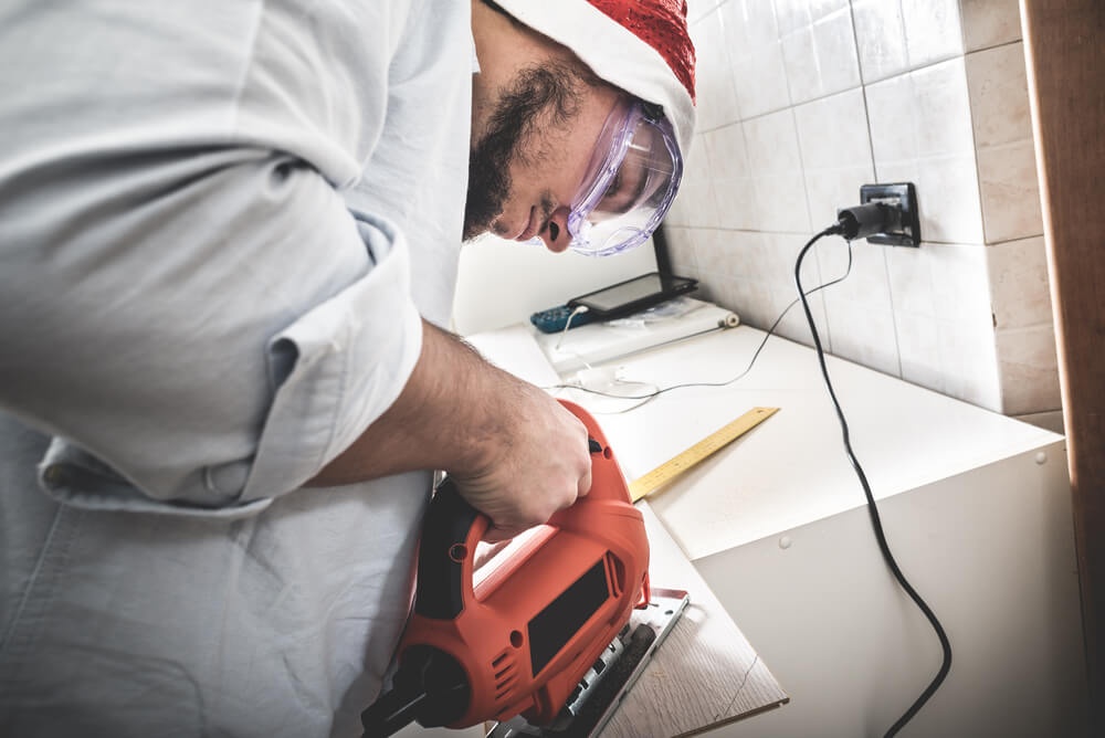 Contractor posting video content on social media and optimizing for SEO for contractors.