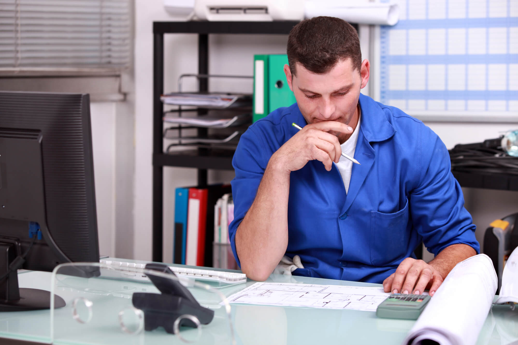 plumber studying his plans