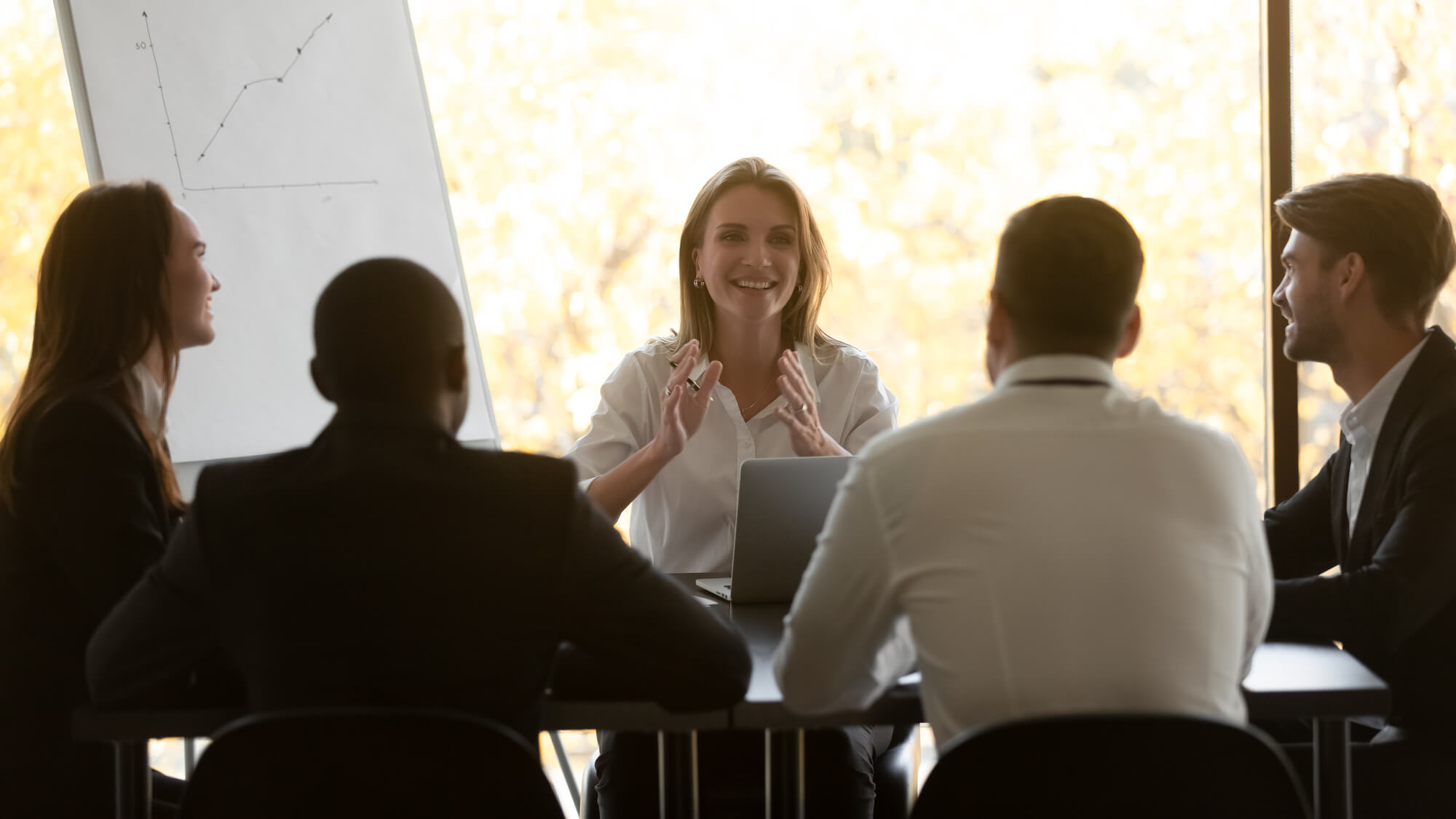 manager and members having a meeting
