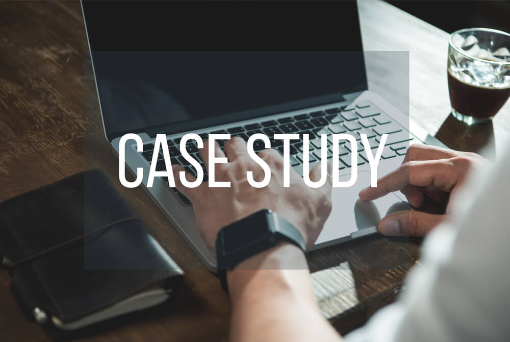 the word 'case study' placed above am image of a business man working on his laptop