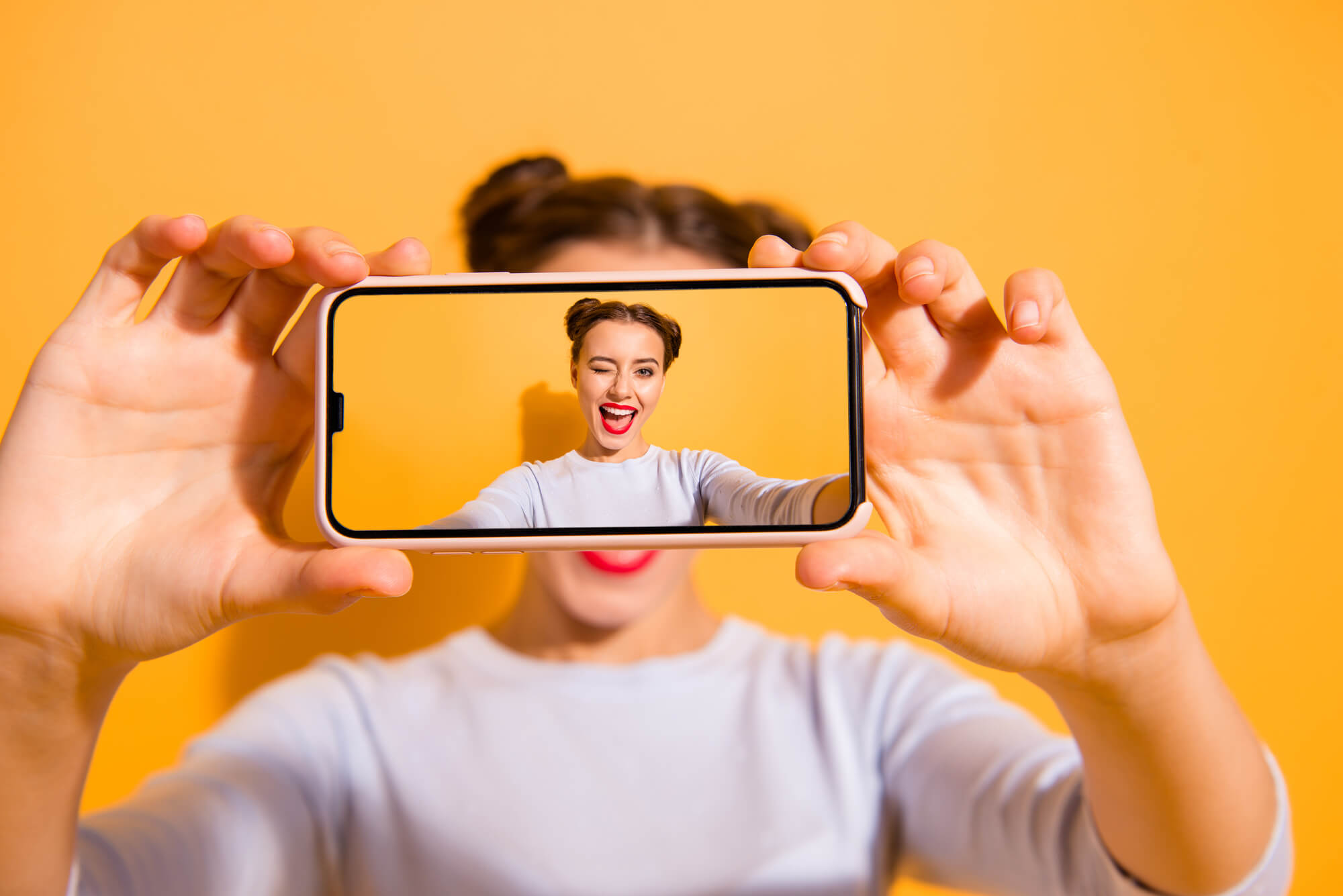 girl taking a selfie