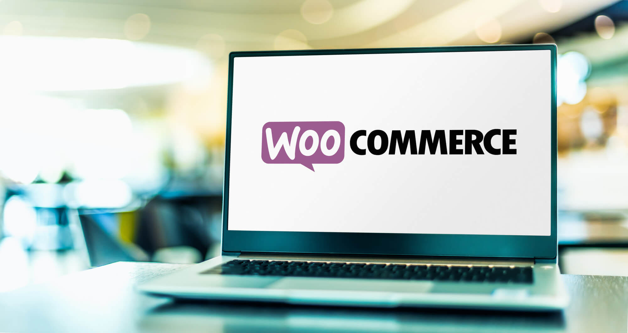 laptop showing woocommerce