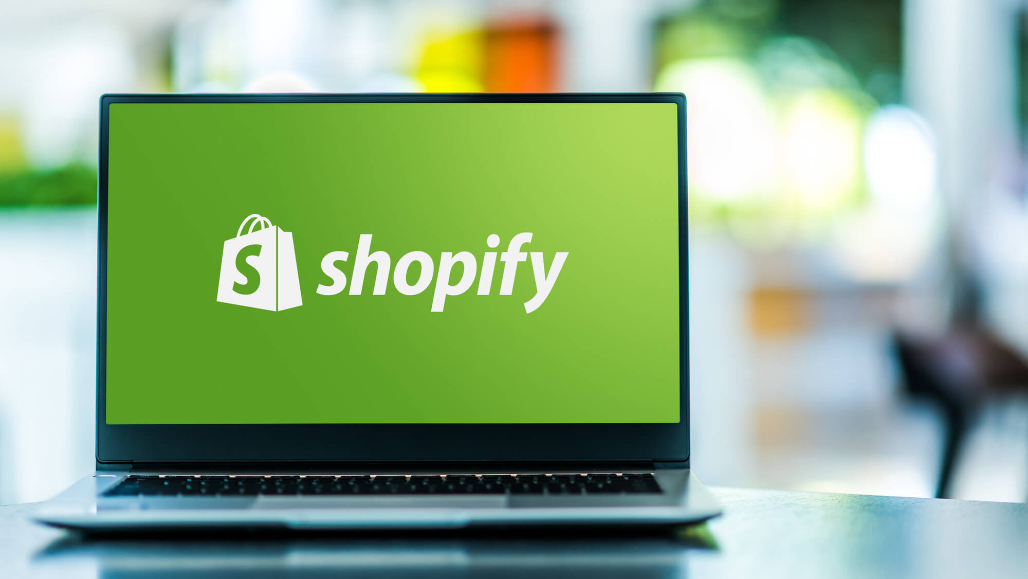 laptop showing shopify