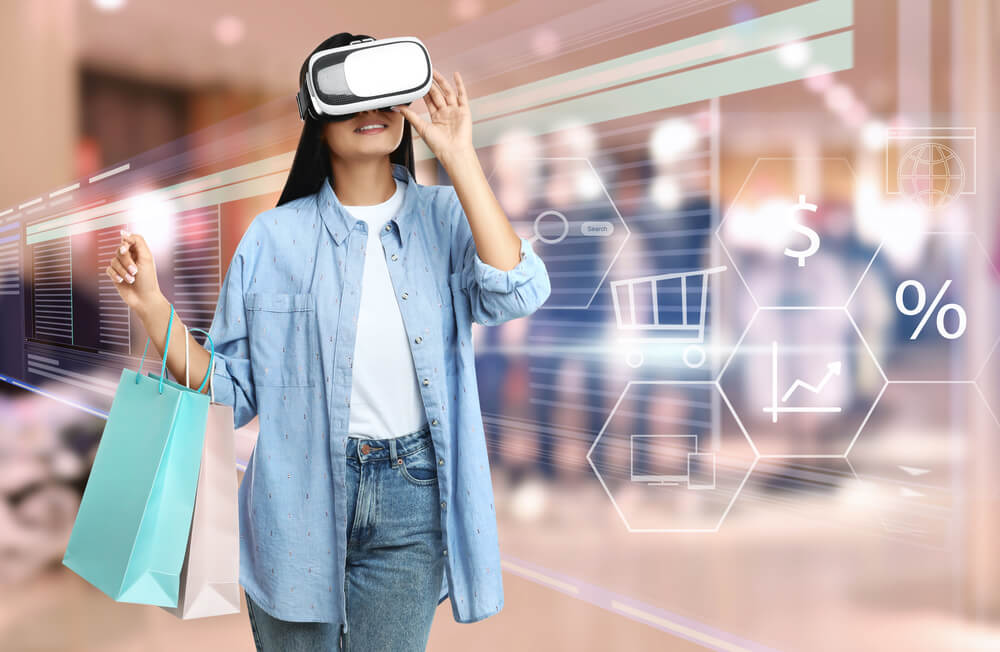 Young woman with shopping bags using virtual reality to listen to a local  business in Miami brand story