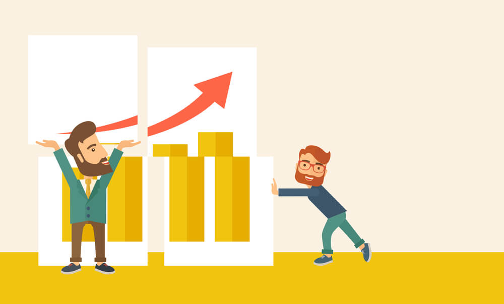 two business men happy and a photo of a graph that shows increase in sales and business growth