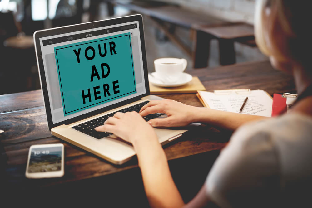 girl looking at an ad copy created by a local SEO in Miami