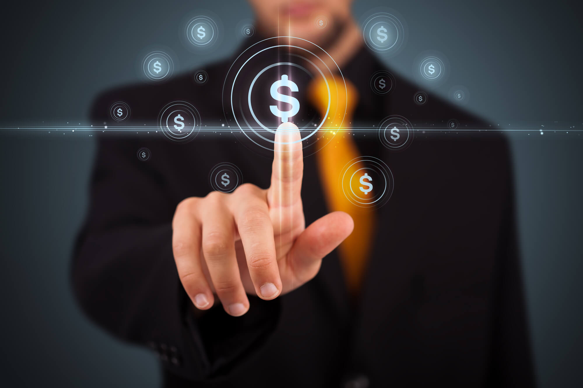 businessman investing his money by clicking the dollar sign button on the screen