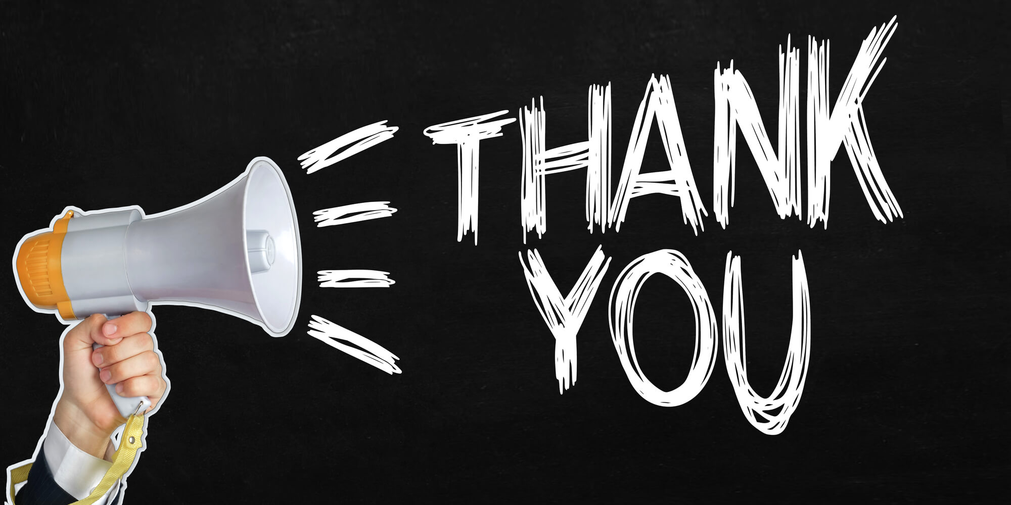 man holding megaphone saying thank you