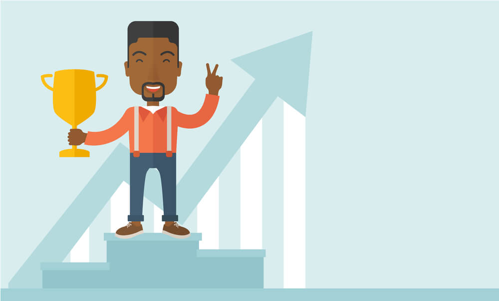 African American employee from a Miami SEO company gets an award for a job well done