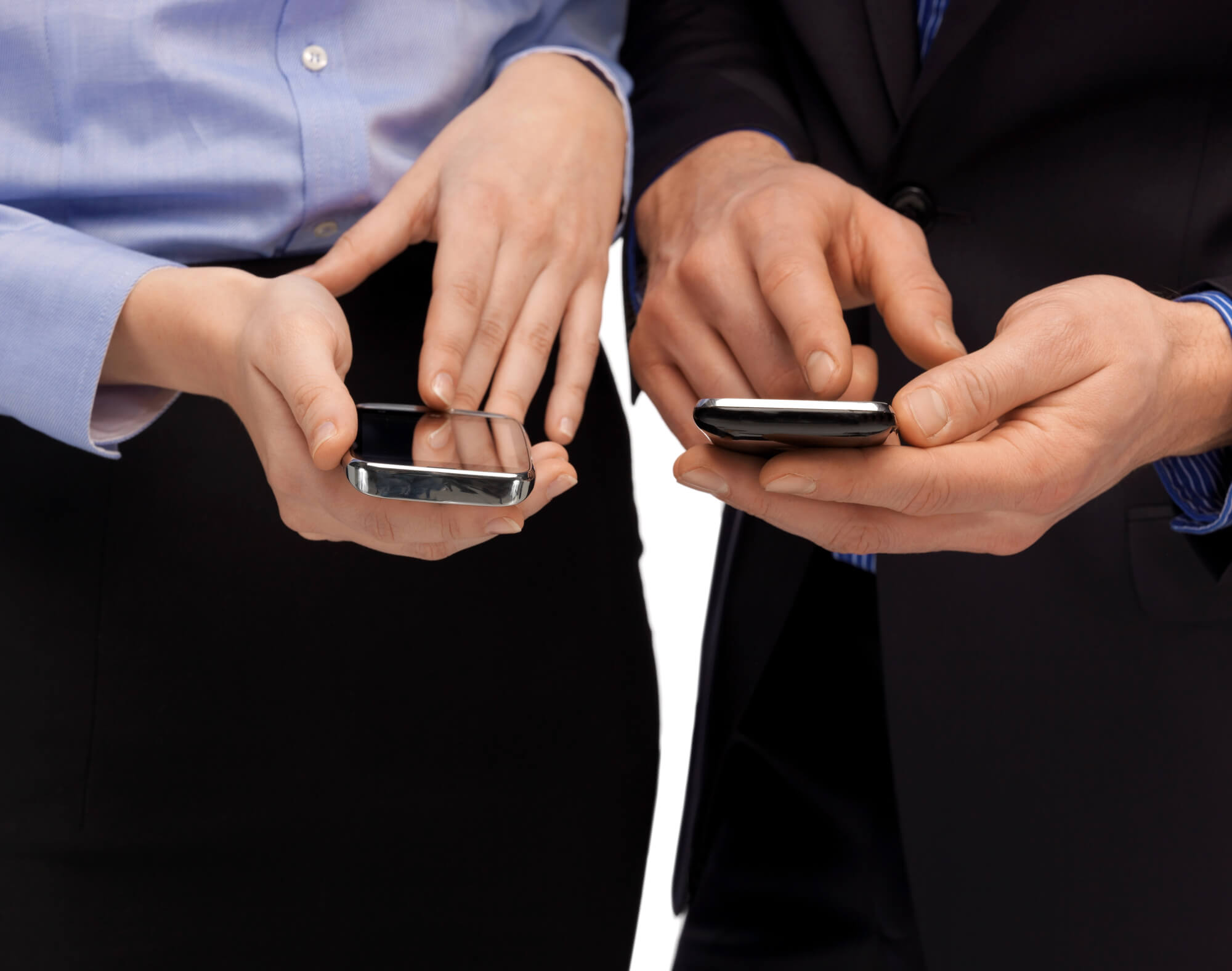 businesswoman and businessman checking their smartphones