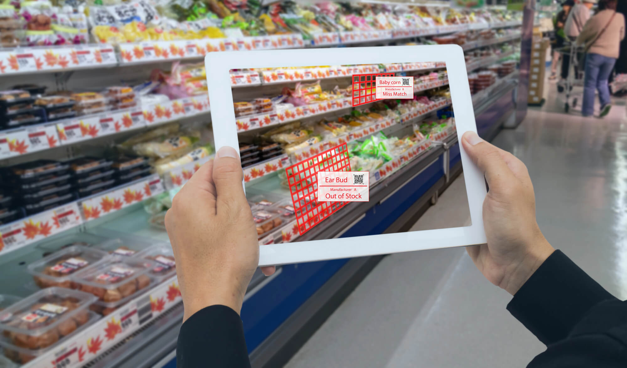 retailer holding a tablet and using AR to monitor details of each product on the shelves