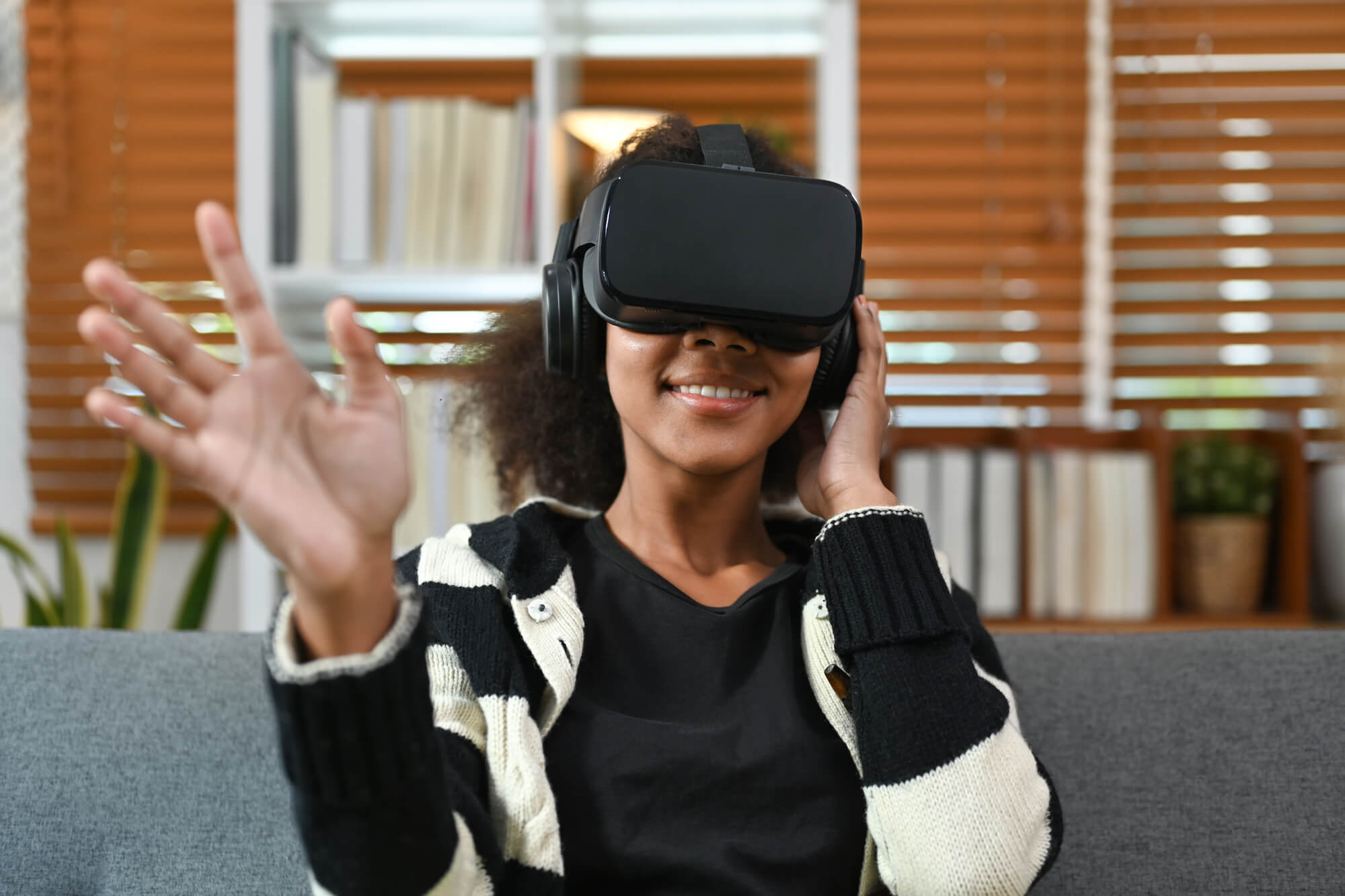 young woman using vr glasses