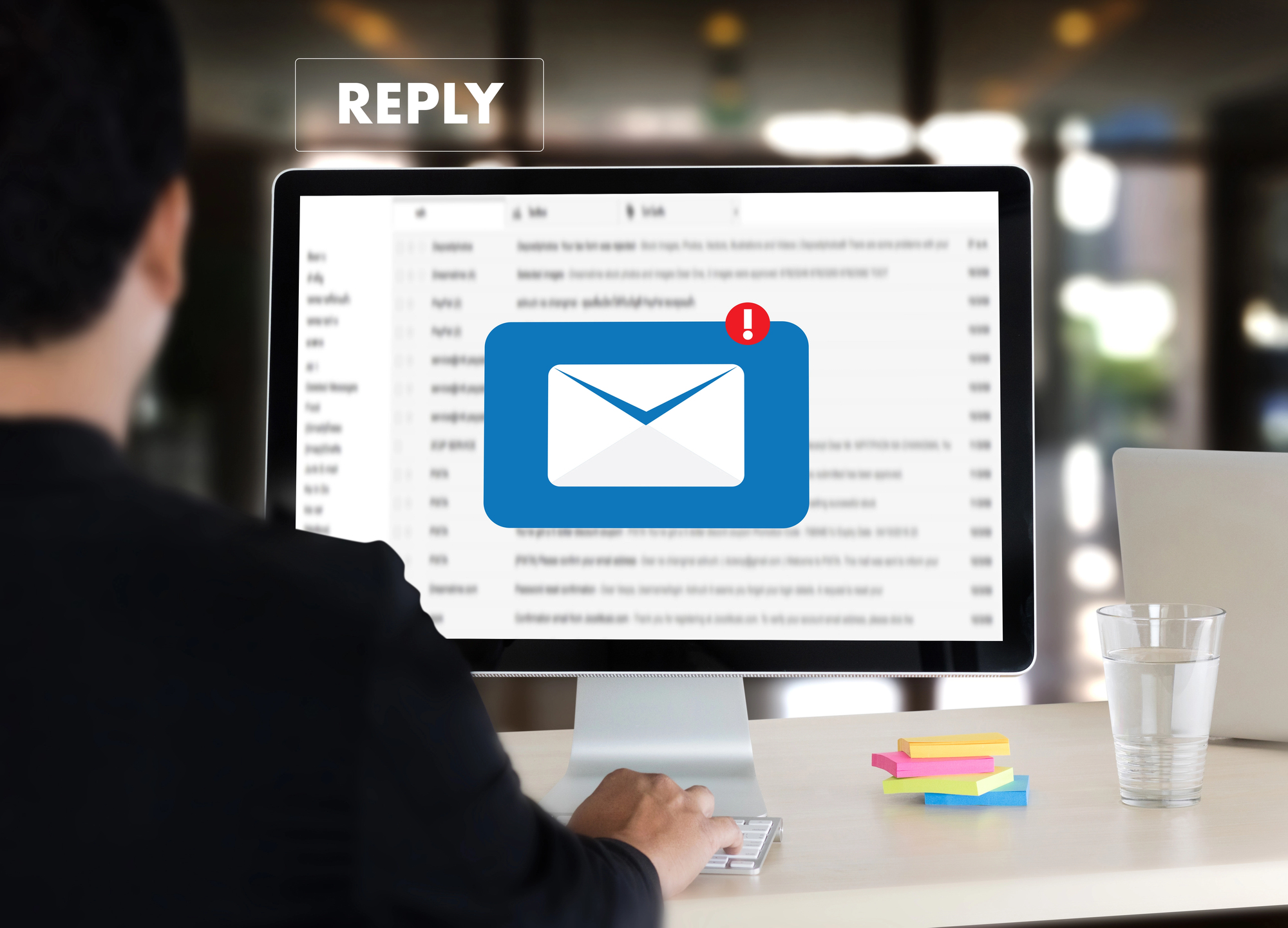 businessman sending an email