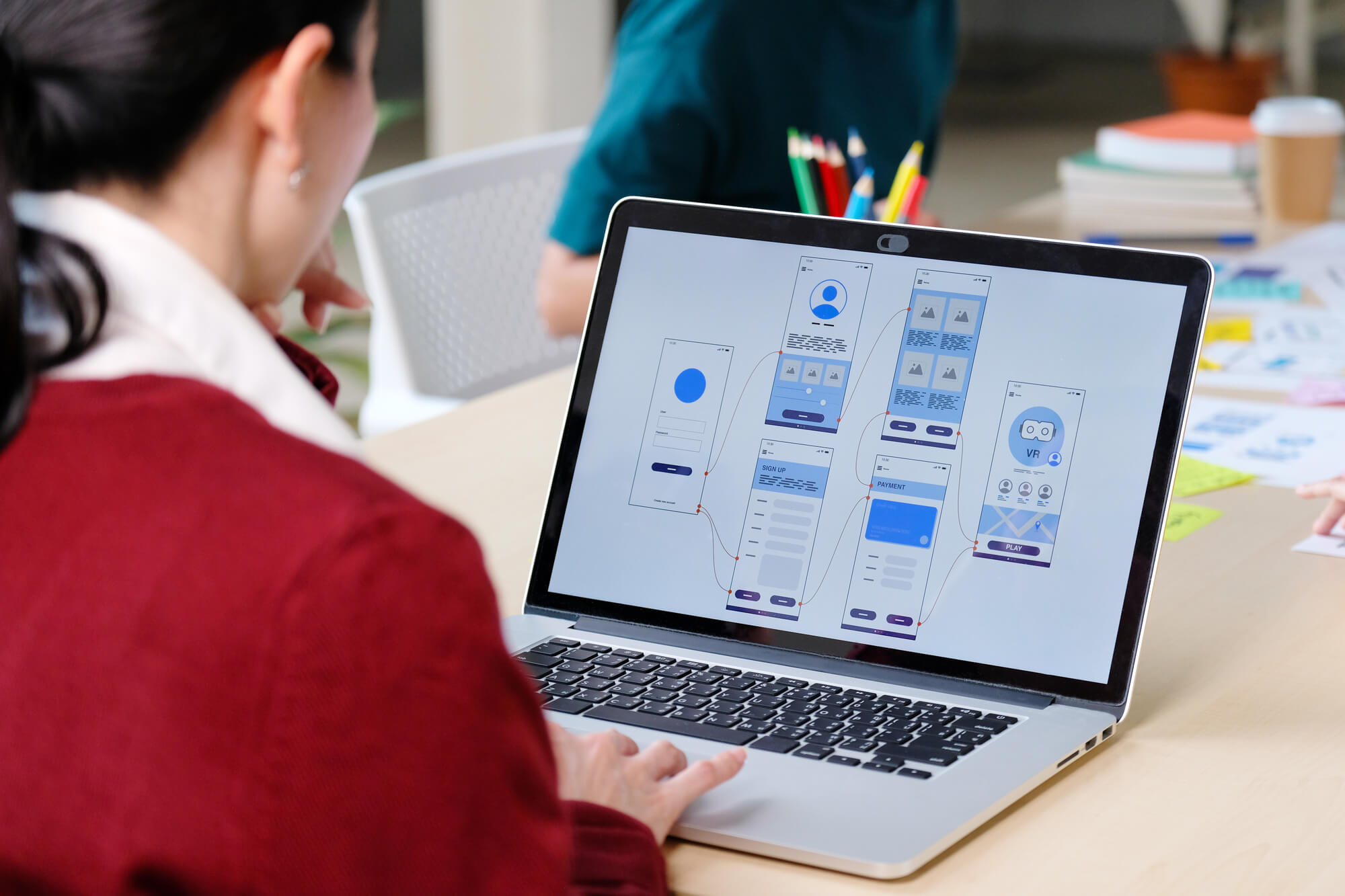 digital marketer designing on laptop